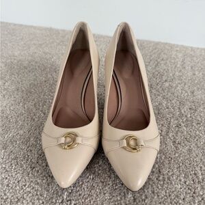 Cream Pointed-Toe Pumps with Gold Accent
